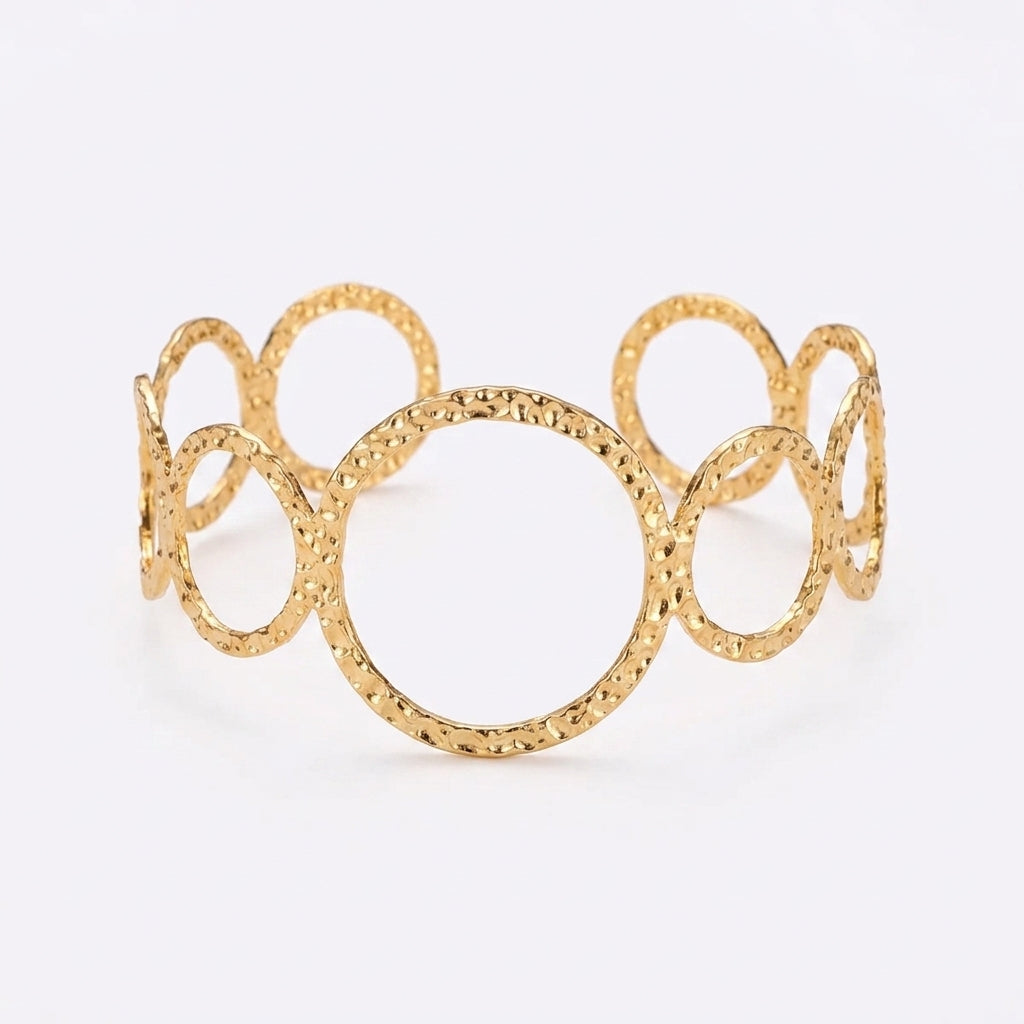 Manchette dorée cercles entrelacés femme
