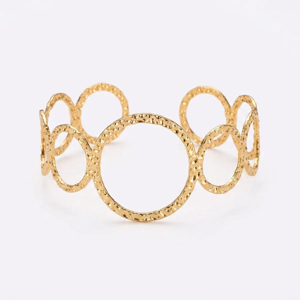 Manchette dorée cercles entrelacés femme