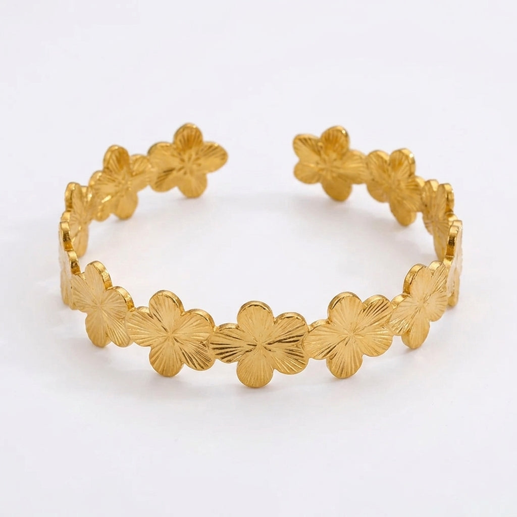 Manchette dorée fleurs aux pétales striés