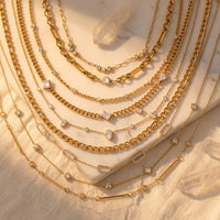 Collier chaîne fine dorée à petites pierres – photo 2