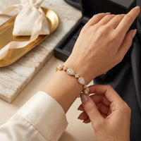 Bracelet tennis doré, pierres en goutte – photo 2