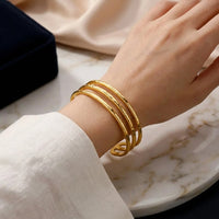 Bracelet jonc doré multi-anneaux texturé – photo 2